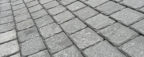 Close-up of finished slate roof repair work